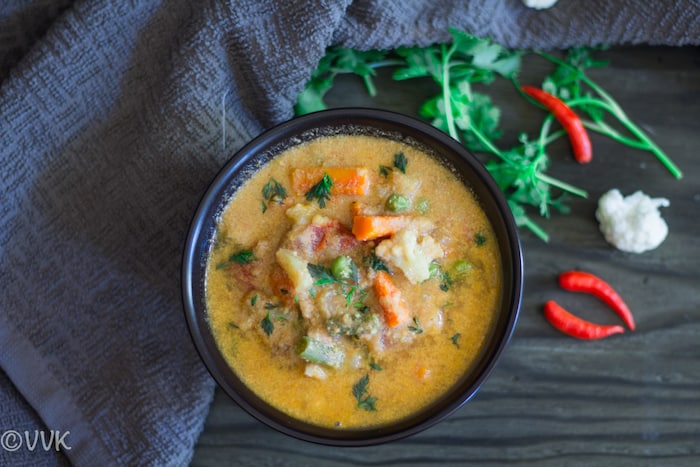 Overhead on the Instant Pot Vegetable Kurma served in a dark bowl