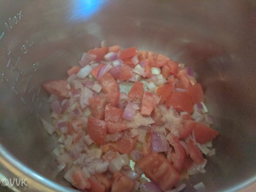 Adding chopped tomatoes, ginger garlic paste and salt