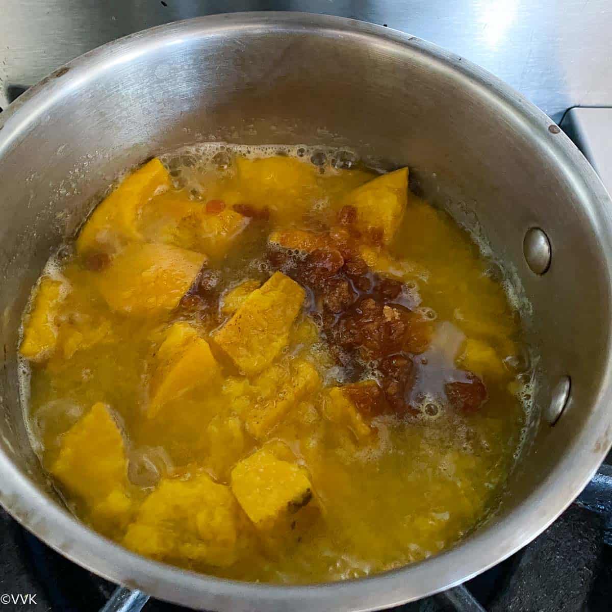 softened mangoes with jaggery