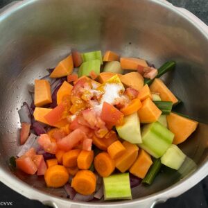 adding the veggies, salt and turmeric
