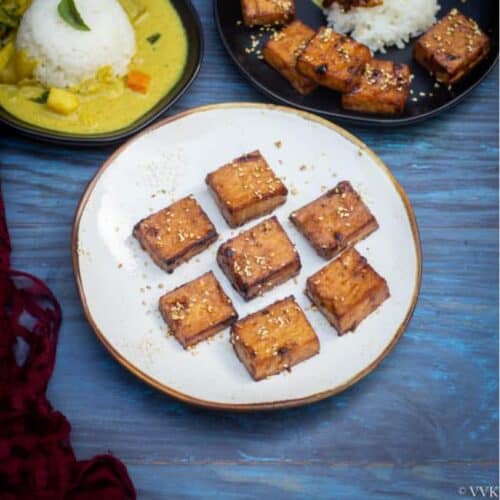 square image of teriyaki tofu recipe on a white plate