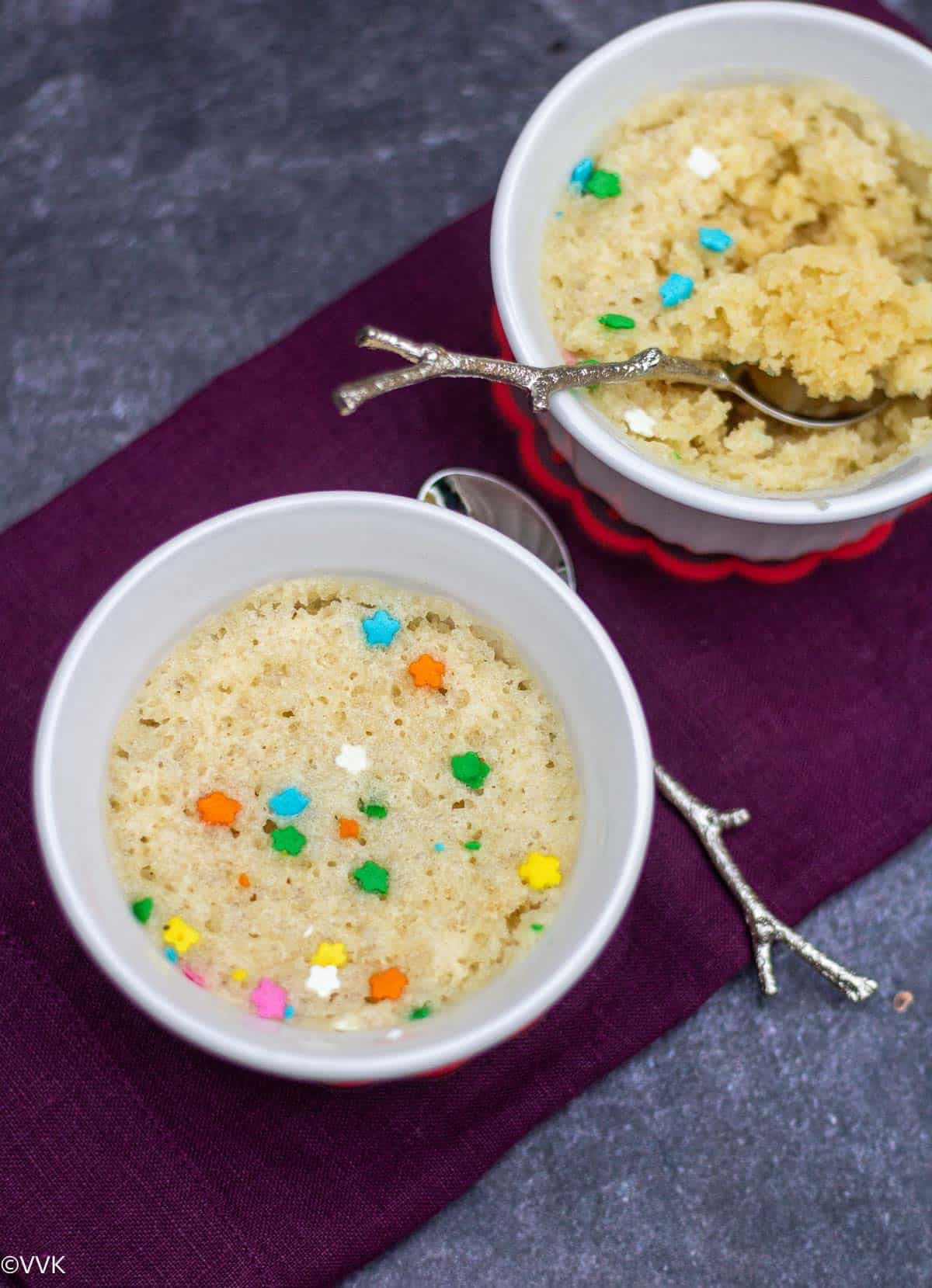 eggles vanilla mug cake served in ramekins with spoons on the side