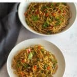 asian pasta salad with text overlay for pinterest