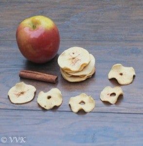 Baked Apple Chips beautifully presented on a big wooden table