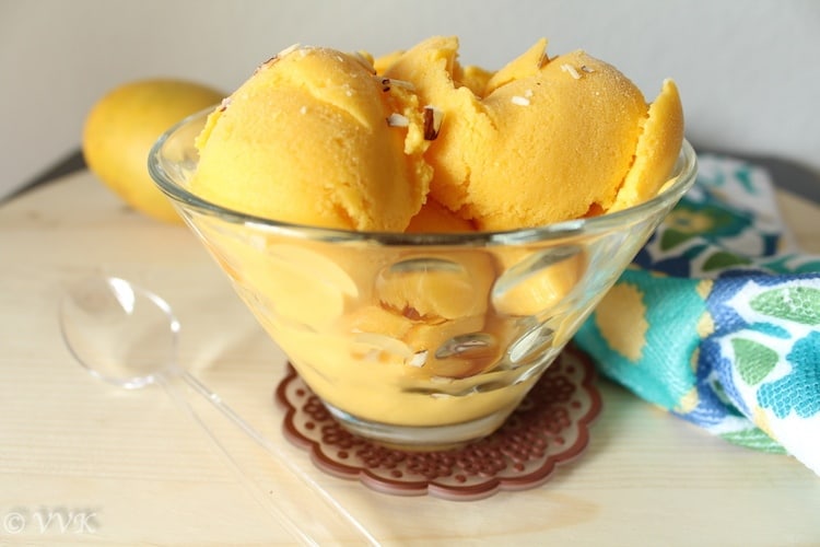 Vegan Mango Ice Cream made with Xanthan Gum and served in a triangle-shaped glass bowl