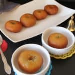 Fantastic Badusha or Balushahi served with a cute little spoon on top of yellow and blue mini holders