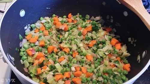 Adding all the veggies and salt