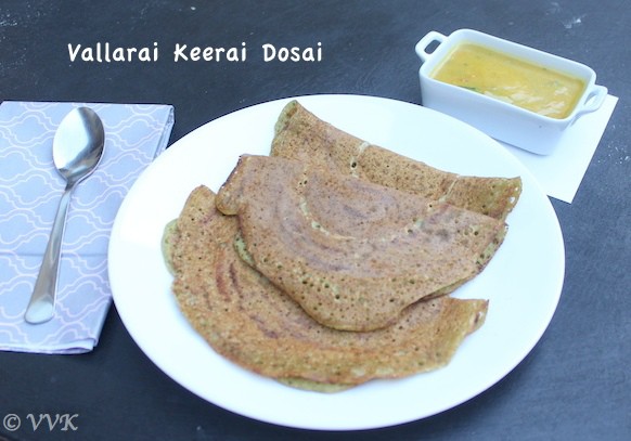 Vallarai Keerai Dosai, Indian Pennywort Dosa served in a white plate with a spoon on the side