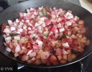 Removing the lid of the skillet and checking that the radish skin is pink