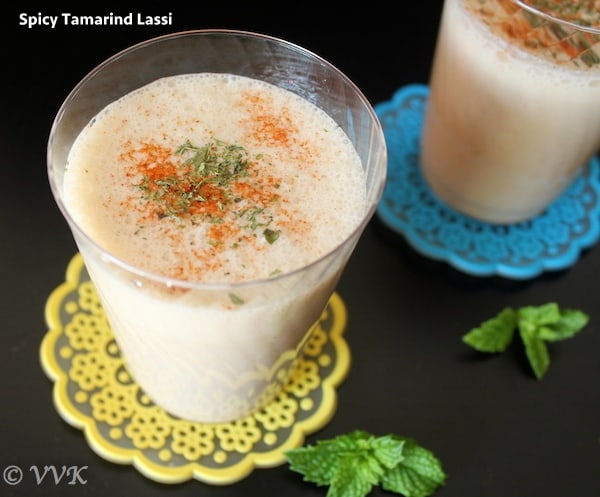 Spicy Savory Tamarind Lassi served in two glass jars