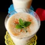 Closeup on the delicious Spicy Savory Tamarind Lassi decorated with mint