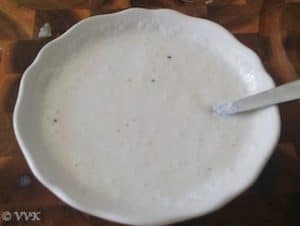 Yogurt mix with added tempering in a white bowl