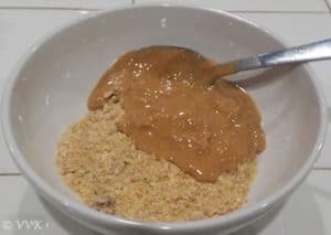 Mixing the peanut butter with the cereal powder