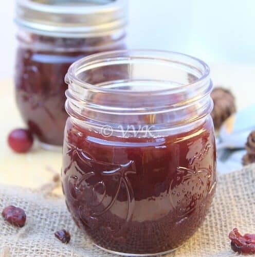 Closeup on the delicious Slow Cooker Cranberry Sauce in a jar