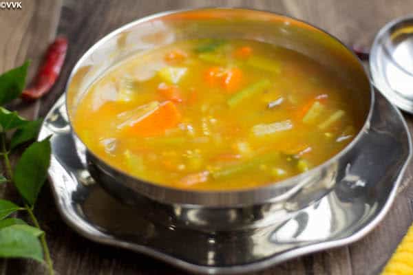 Instant Pot Mixed Vegetable Sambar ready and served in a nice metal bowl