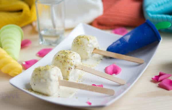 Three portions of Almond Kulfi ice cream on a white plate