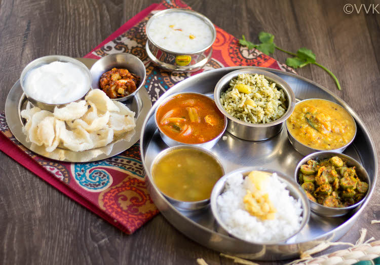 Andhra Telangana Thali Spread served on a beautiful cloth on a wooden table