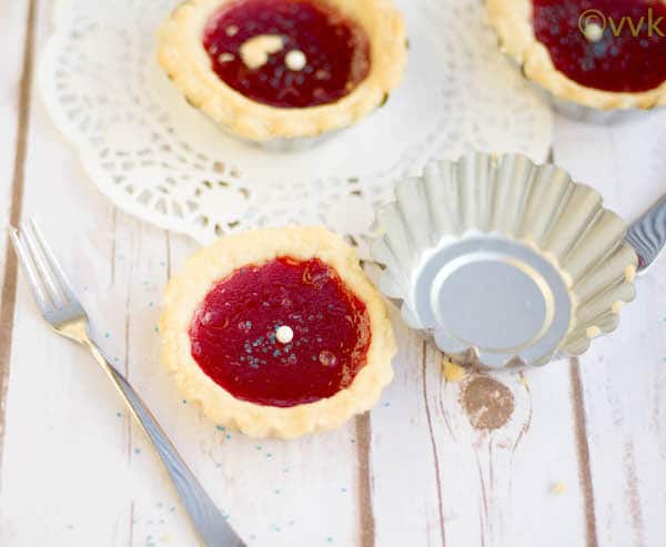 Closeup on the amazing three Strawberry Jam Tarts looking absolutely inviting