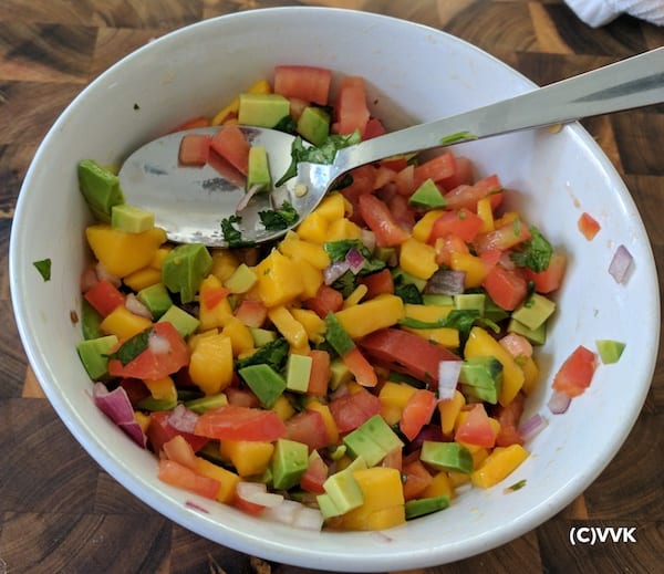 Recipe Step Image - Mixing Vegetables and Mangoes