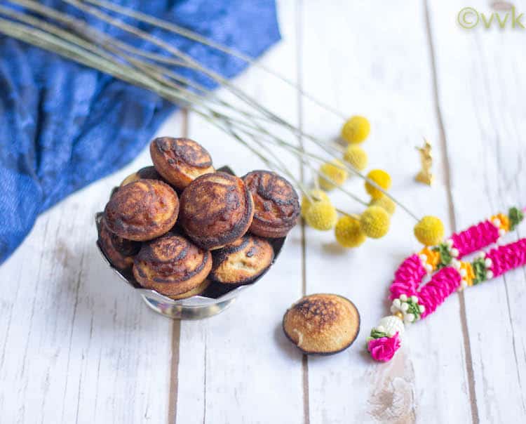 Festive Paniyaram Pan Nei Appam recipe made extra speial with a sprig of yellow flowers