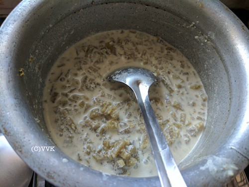Adding yogurt-coconut paste and mixing them thoroughly