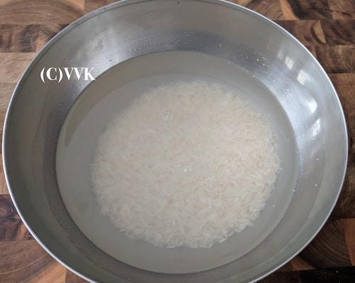 Washing the basmati rice and soaking it in water