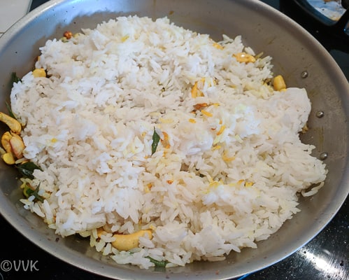 Adding the cooked rice, wild-lemon juice and salt