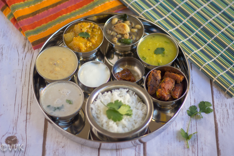 Vegetarian Konkani Thali served in a metal tray