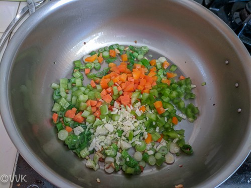 Adding veggies and cooking