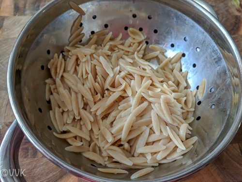 Draining water from the pasta