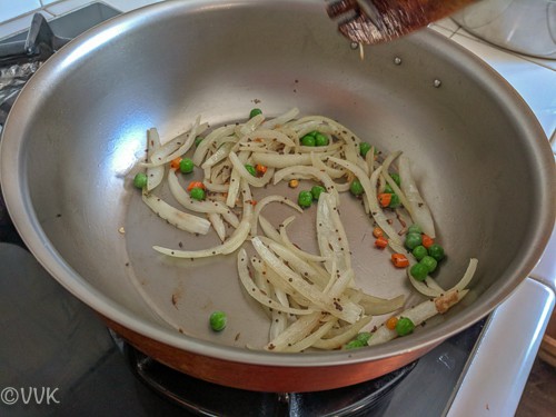 Adding peas and cooking for two minutes