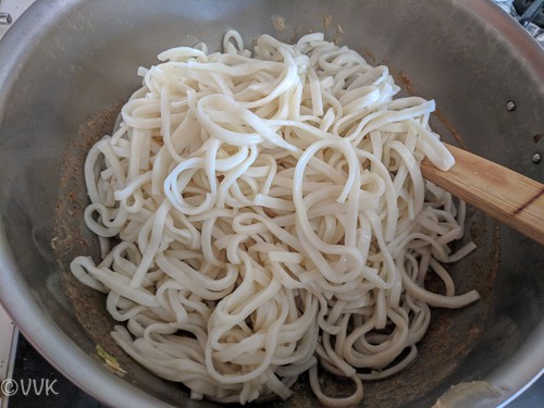Adding the cooked noodles