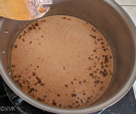 Adding yogurt mix to the pan