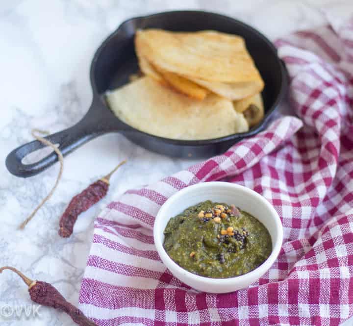 Parsley Chutney served with a full pan of dosas