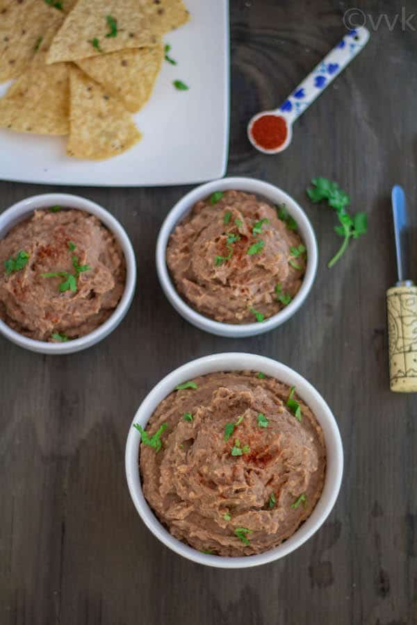 Instant Pot Vegetarian Refried Beans served in white bowls