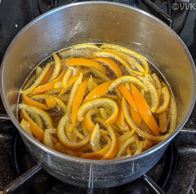 Add the cooked mandarin peels to the mix