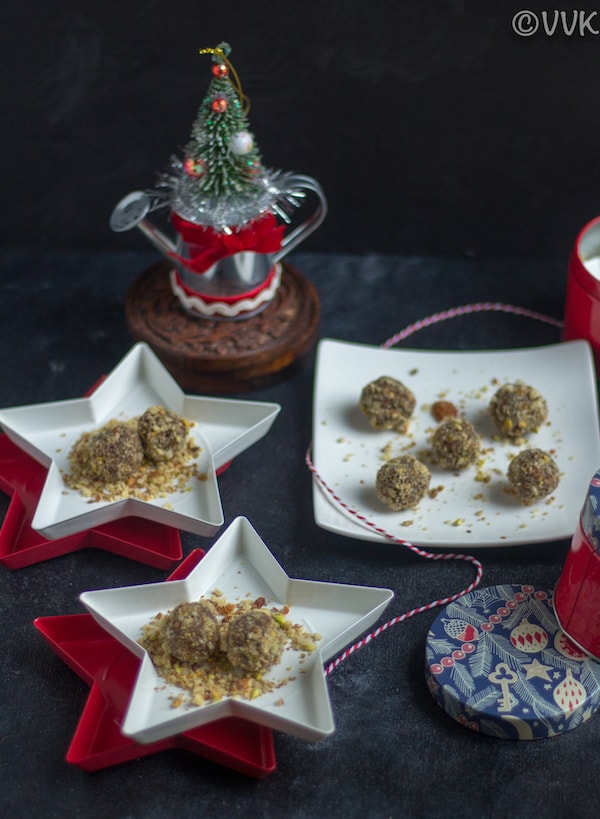 Pumpkin Pie Spiced Date and Nut Balls served in festive stars with Christmas decorations