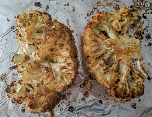 Cauliflower steaks brushed with the Worcestershire sauce before baking again