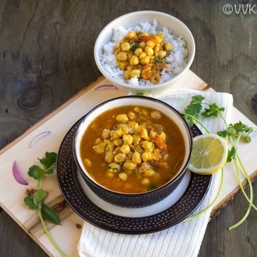 chickpeas curry with rice bowl on the top