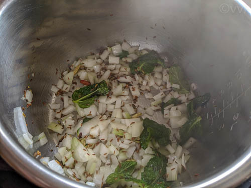 gongura pickle pulav adding onion and mint