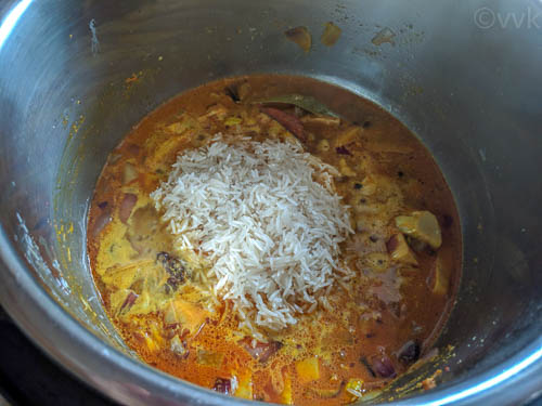 jackfruit biryani step adding rice