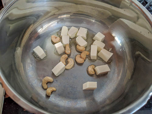 lucknowi biryani - frying panner and cashews.