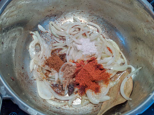lucknowi biryani - adding spices