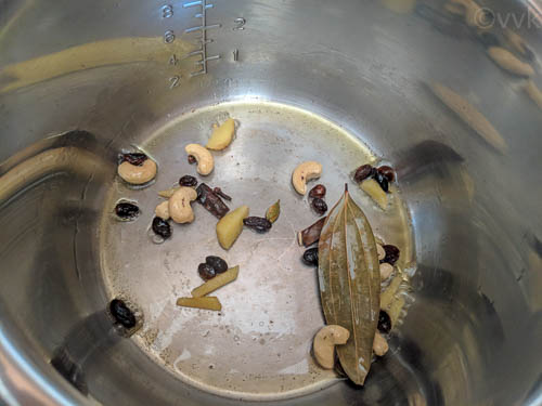 mishti pulav adding nuts and raisins