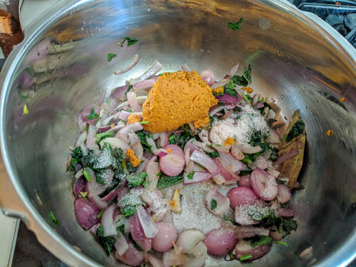 onion biryani adding the ground masala