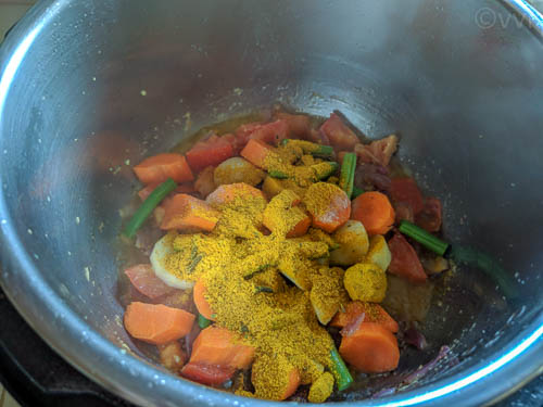 sindhi veg biryani - adding veggies and masala