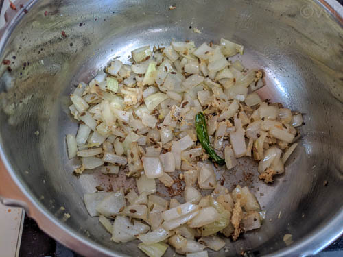 veg biryani cooking onions