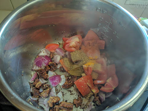 wadi ki biryani adding spices and tomato