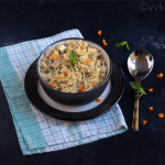 yakhni pulav in a bowl on a plate