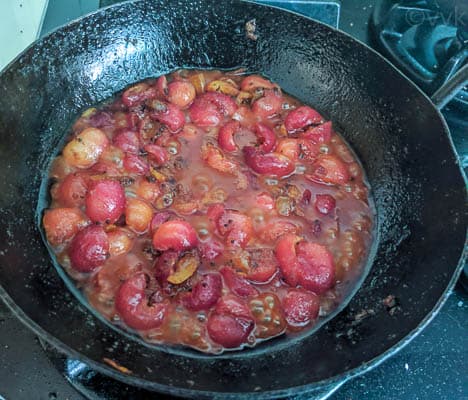 cherries cooking in spices